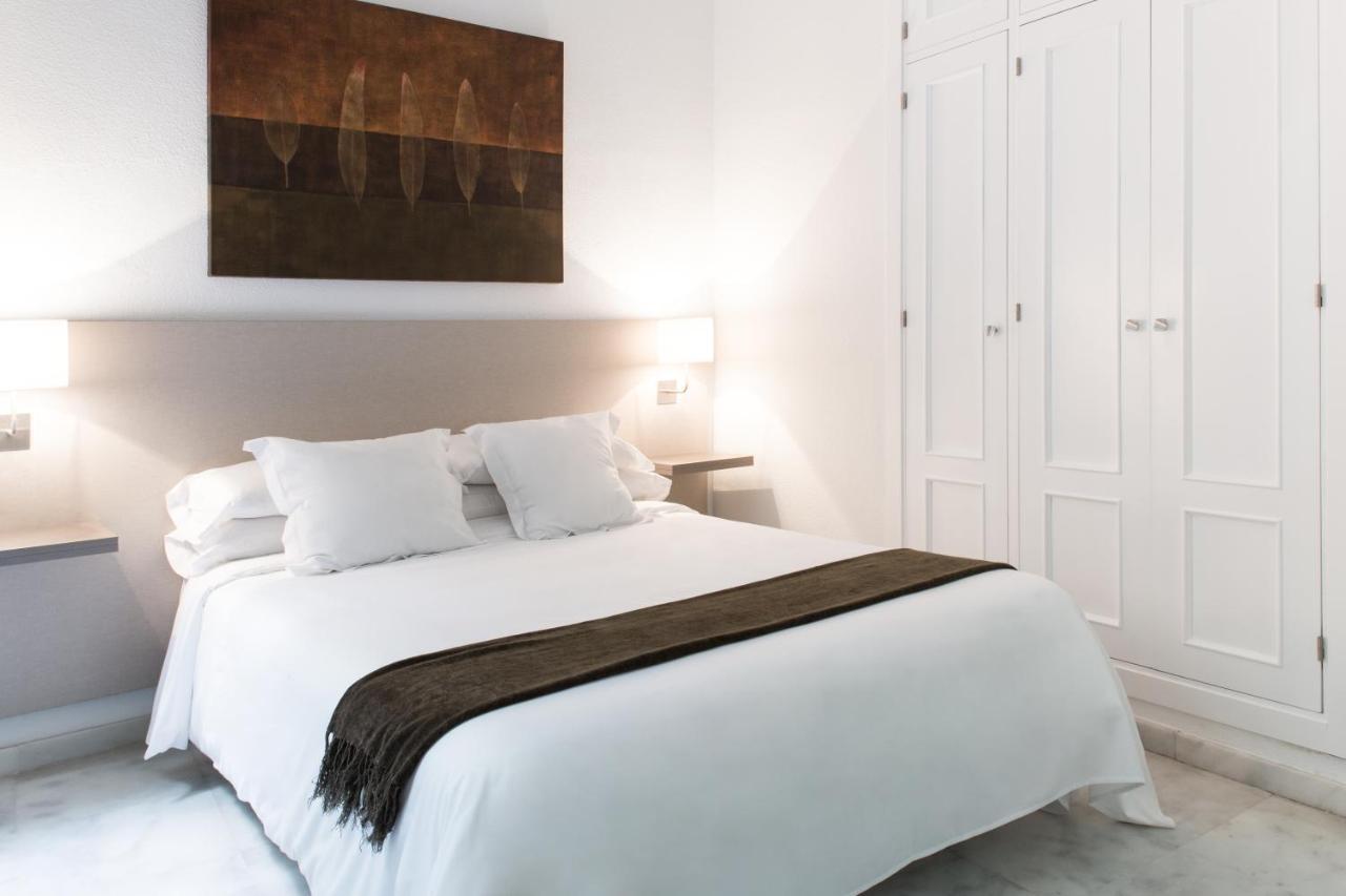 Apartamentos La Casa Del Pozo Santo เซบีญา ภายนอก รูปภาพ