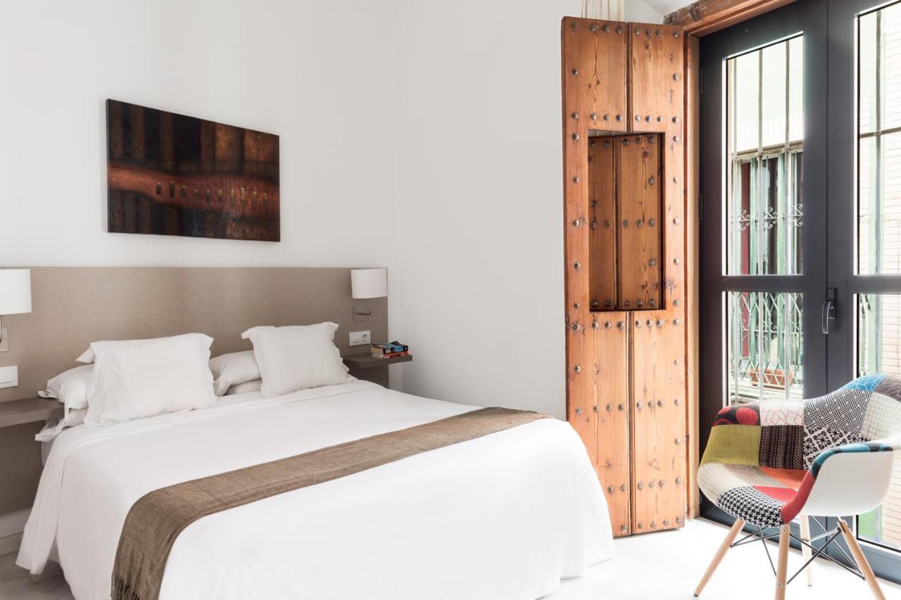 Apartamentos La Casa Del Pozo Santo เซบีญา ภายนอก รูปภาพ