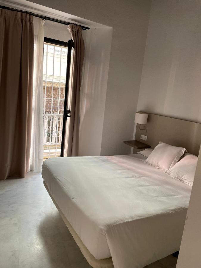 Apartamentos La Casa Del Pozo Santo เซบีญา ภายนอก รูปภาพ
