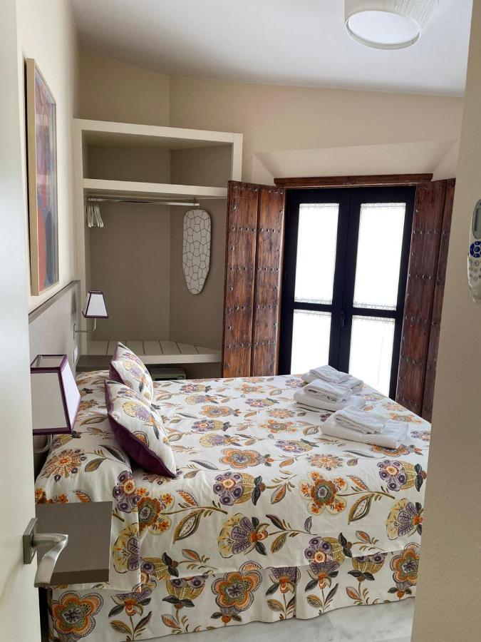 Apartamentos La Casa Del Pozo Santo เซบีญา ภายนอก รูปภาพ